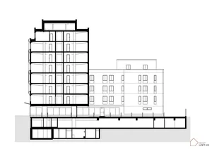A modern apartment building with glass walls in a sectional view.
