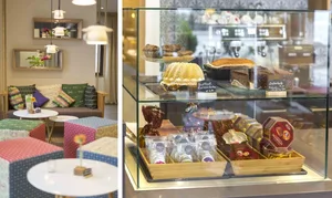 A cozy coffee shop interior with colorful cushions, a glass display case, and various pastries.