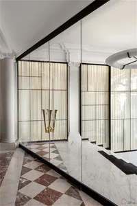 Modern interior design featuring glass walls in a contemporary space.
