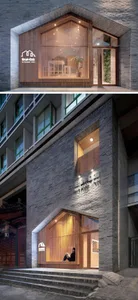 A modern commercial building facade with brick, concrete, and wooden elements