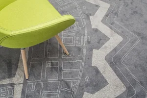 A modern design floor plan with a geometric pattern on the carpet