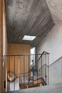 Concrete and wooden staircase interior
