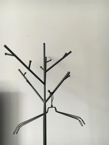 A modern metal tree rack with multiple hooks and hangers.