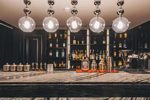A luxurious industrial-style bar counter made of marble.