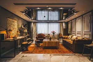 Industrial living room featuring leather furniture, wooden table, and decorative elements.