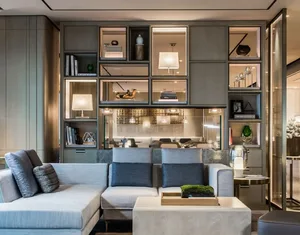 Modern living room with contemporary furniture, shelves, and lighting.