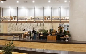 Modern restaurant interior with wooden decor, showcasing clean and minimalist design.