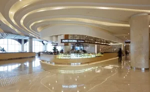 A sleek, modern retail space featuring a stylish marble counter.