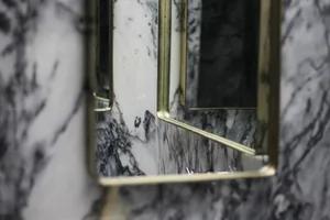 A modern marble bathroom with a sleek, polished finish.