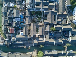 Aerial view of ancient Chinese village with traditional architecture.