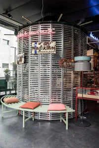Industrial-style interior with metal features and retro signage.