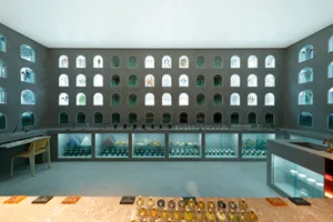 A modern interior with glass windows and concrete walls.