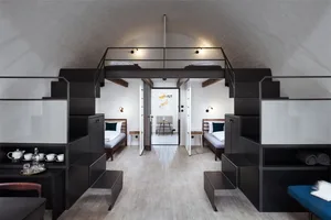 Modern loft interior with concrete, wood, and metal textures