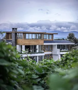 Modern residential architecture featuring wood and glass materials.