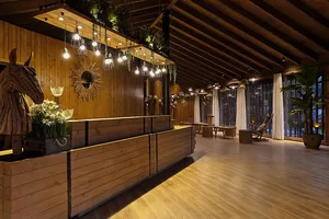 Modern reception area with wooden accents and hanging lights