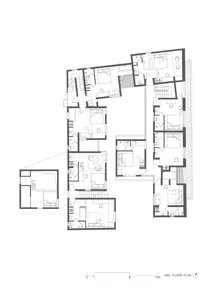 Detailed architectural blueprint of an apartment's second floor layout.