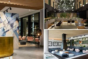 A modern hotel lobby featuring concrete and wooden elements.