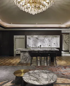 A modern kitchen with a marble countertop and backsplash, under a large, round, chandelier-like light fixture.