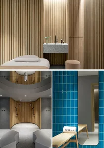 A modern bathroom with a blue tiled wall, a wooden panel wall, and a white stone countertop with a sink and faucet.