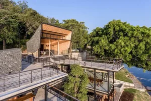 Contemporary residential house featuring modern design elements and eco-friendly materials.