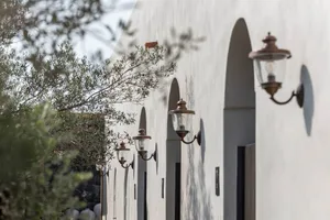 Concrete columns on a white exterior building