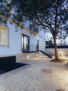 Modern architecture featuring tiled floor and stone accents.