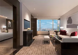 Modern living room featuring a city view and contemporary furniture.