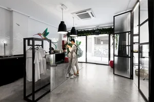 Minimalist retail storefront with glass and concrete elements