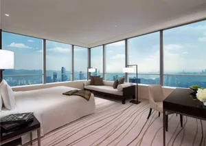 A modern residential interior featuring a bedroom with a large window overlooking a cityscape.