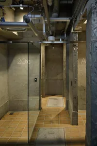 Industrial-style interior with concrete flooring and metal elements