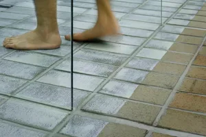 Close-up of minimalist ceramic floor tiles in a modern setting.