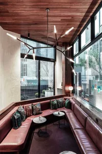 Modern interior design featuring leather furniture in a contemporary space.