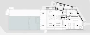 A modern office space plan featuring concrete elements.
