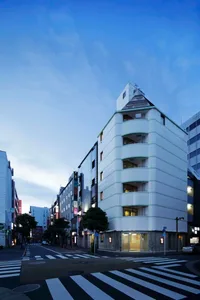 A white concrete building with modern architectural design.