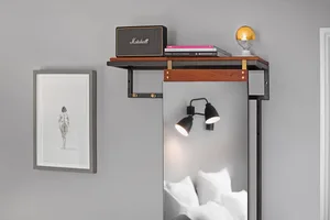 A bedroom with an industrial design aesthetic featuring metal and wood elements.