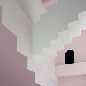 A staircase painted in a modern art style with pink, white, and light blue geometric shapes.