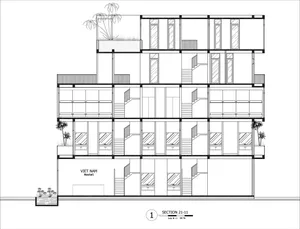 Viet Nam Hostel designed interior layout with concrete, glass, and metal materials.