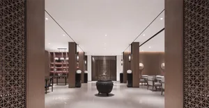 A modern lobby featuring marble and glass
