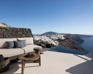 Concrete terrace overlooking a village and ocean