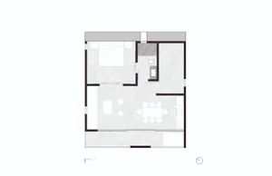 A minimalist bedroom floor plan with a bed, dresser, and nightstand