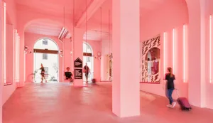 A modern retail store with concrete floors and minimalist design.