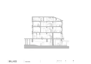Cross-sectional diagram of a residential building with multiple levels and detailed interior layouts.