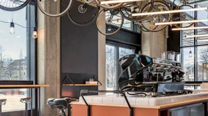 Modern coffee shop with metal and wooden accents