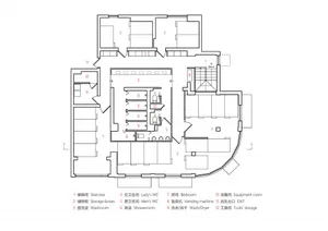 Floor plan of a residential building showing rooms, bathrooms, and common areas.
