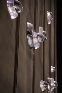 Modern interior design featuring metallic and acrylic decorations.