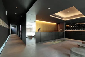 Modern reception desk with wood and concrete materials
