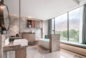 Modern residential bathroom featuring a contemporary marble design.