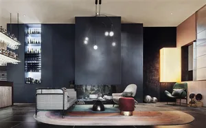 A modern bar lounge with metal, glass, and leather materials, featuring a circular rug, seating, and a bar area.