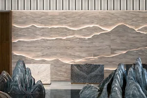 A modern lobby featuring marble, concrete, and metal materials.