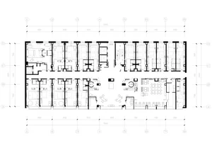 Detailed architectural drawing of an office layout showing rooms and corridors.